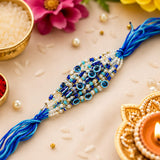 Blue Pearl & Evil Eye Designer Rakhi – Elegant Raksha Bandhan Gift