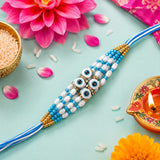 Blue & White Evil Eye Beaded Rakhi – Stylish Raksha Bandhan Gift